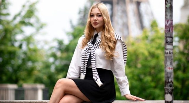 Paris summer outfit by the Seine with light dress, blazer, and comfortable sandals