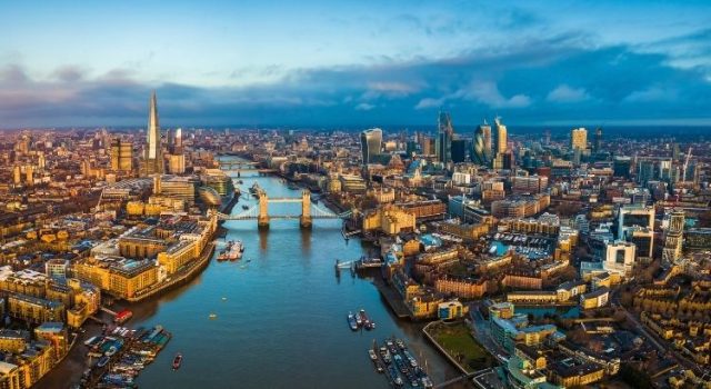 london-4-days-itinerary-skyline Aerial view of London with the River Thames, Tower Bridge and the Shard at sunrise