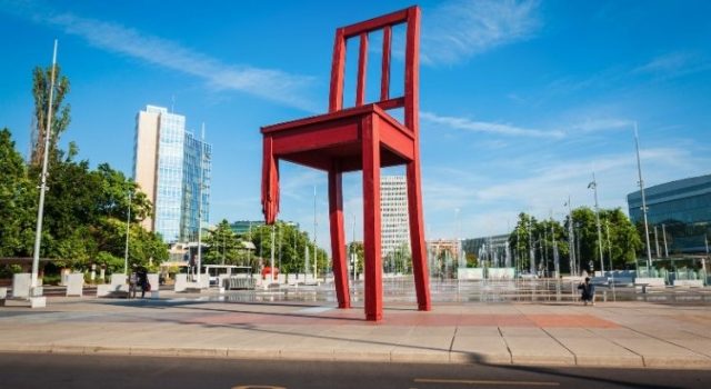 The Broken Chair monument in Geneva, a well-known landmark along a walkable city itinerary near Place des Nations.
