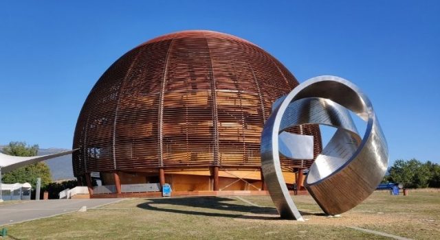 The CERN Science Gateway building near Geneva, a key stop for visitors arriving by Tram 18 for guided tours and science exhibits.