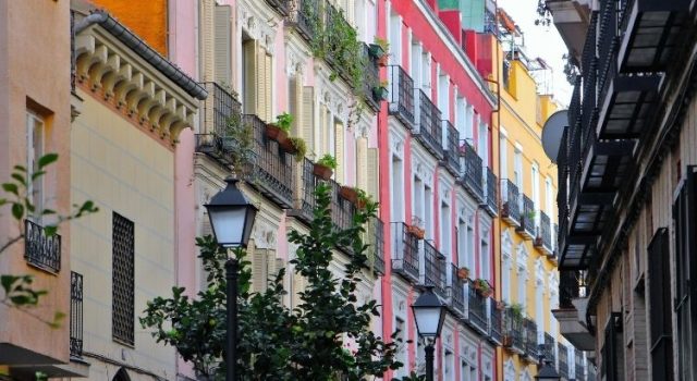 Colorful historic buildings and balconies in Geneva Old Town, part of the Vieille Ville walking route and its hidden passages.