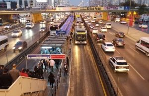 Istanbulkart Diaries: My Magic Key to the City (and How Not to Get Stuck) (2026) Metrobus station in Istanbul with commuters using public transport system and Istanbulkart access